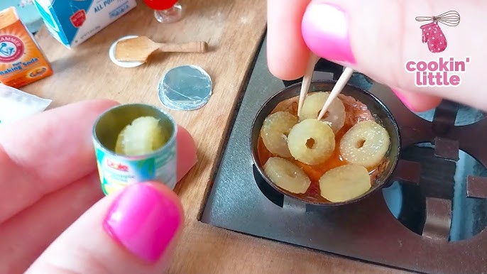 A Miniature American Breakfast Prepared With Tiny Cooking Utensils