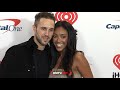 Tayshia Adams, Zac Clark arrive at 2021 iHeartRadio Music Festival