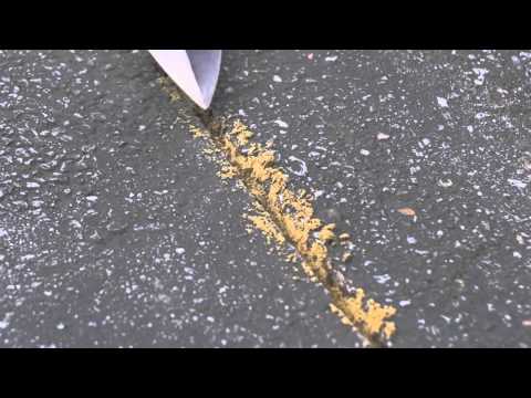 Vidéo: Comment réparer une fissure dans une allée goudronnée ?