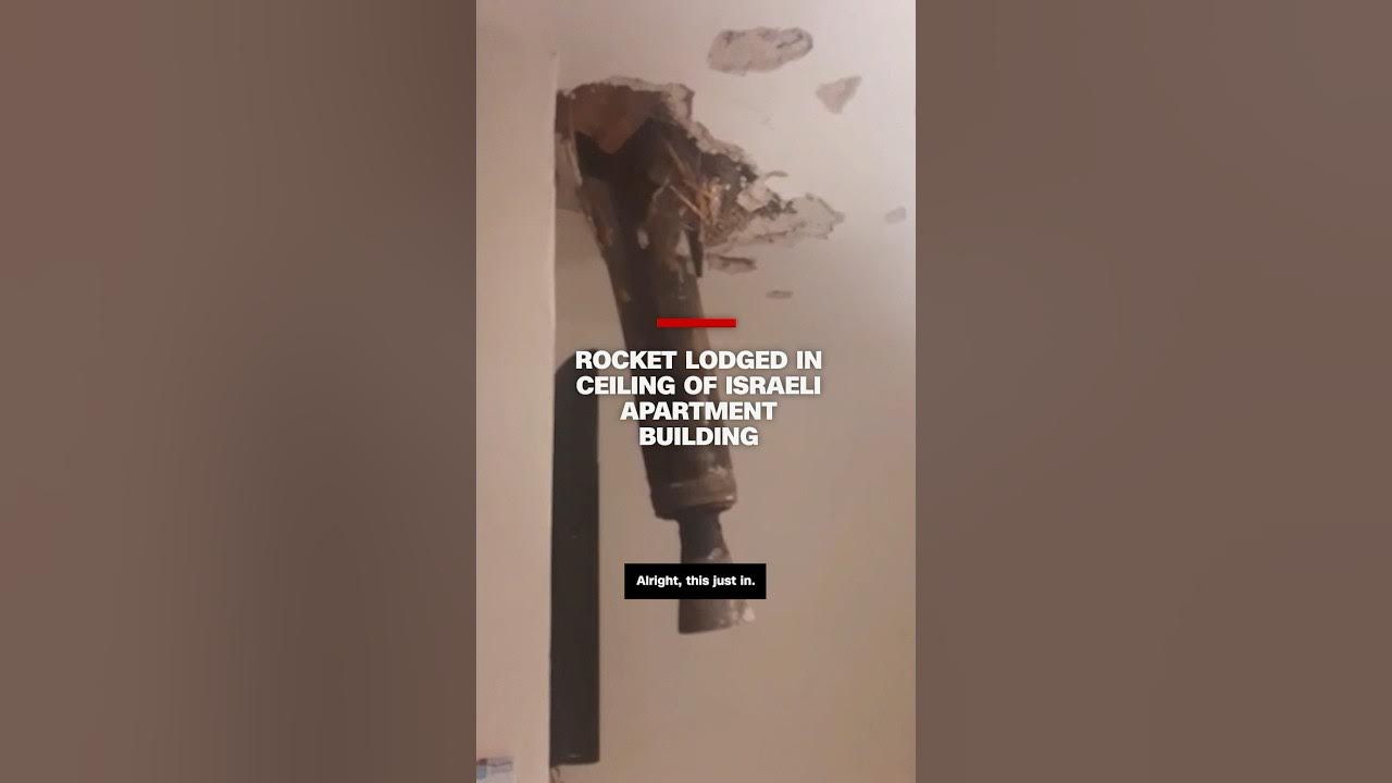 Rocket lodged in ceiling of Israeli apartment building