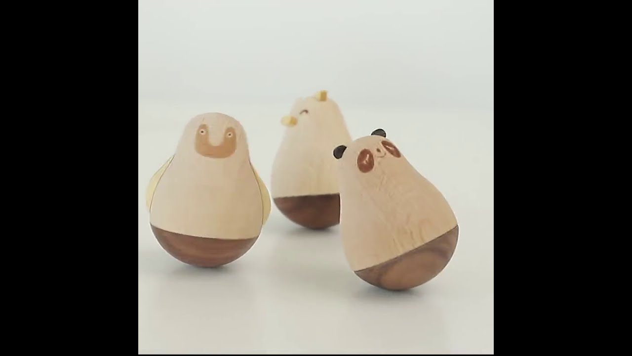 wooden roly poly toy doll