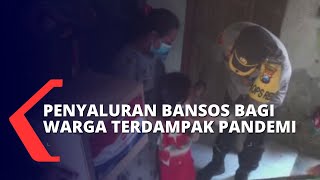 TNI-Polri Salurkan Bansos bagi Warga Terdampak Pandemi Covid-19