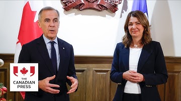 Carney, Alberta Premier Smith sign pipeline deal