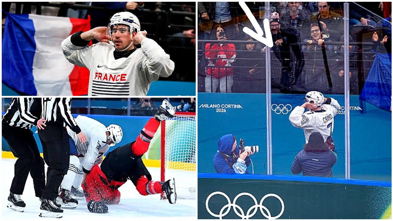 Пьер Кринон из Франции жестом приветствует болельщиков после драки с американским хоккеистом на О...