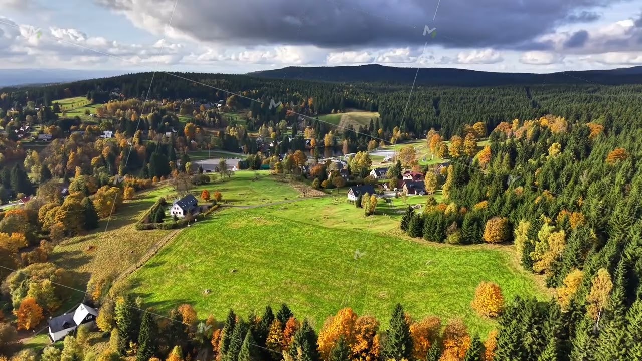 countryside landscape imagery, open green fields encircling solitary farmstead with wooded edges