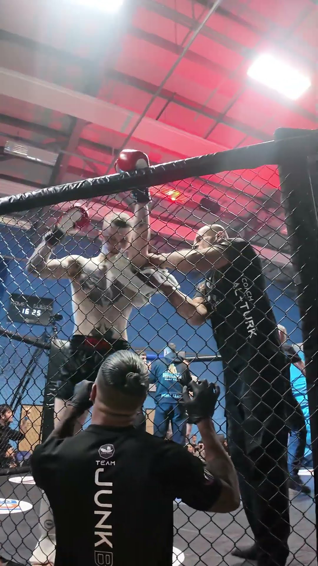 Sonny Mercer getting some guidance from his team during his Muay Thai fight on Combat Kings 5