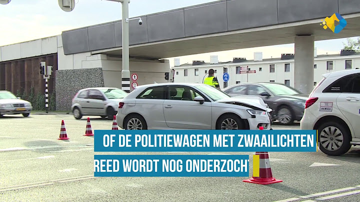 Politiewagen botst met personenauto in Maastricht