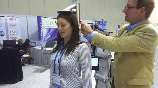 Girl takes her height and weight at public event