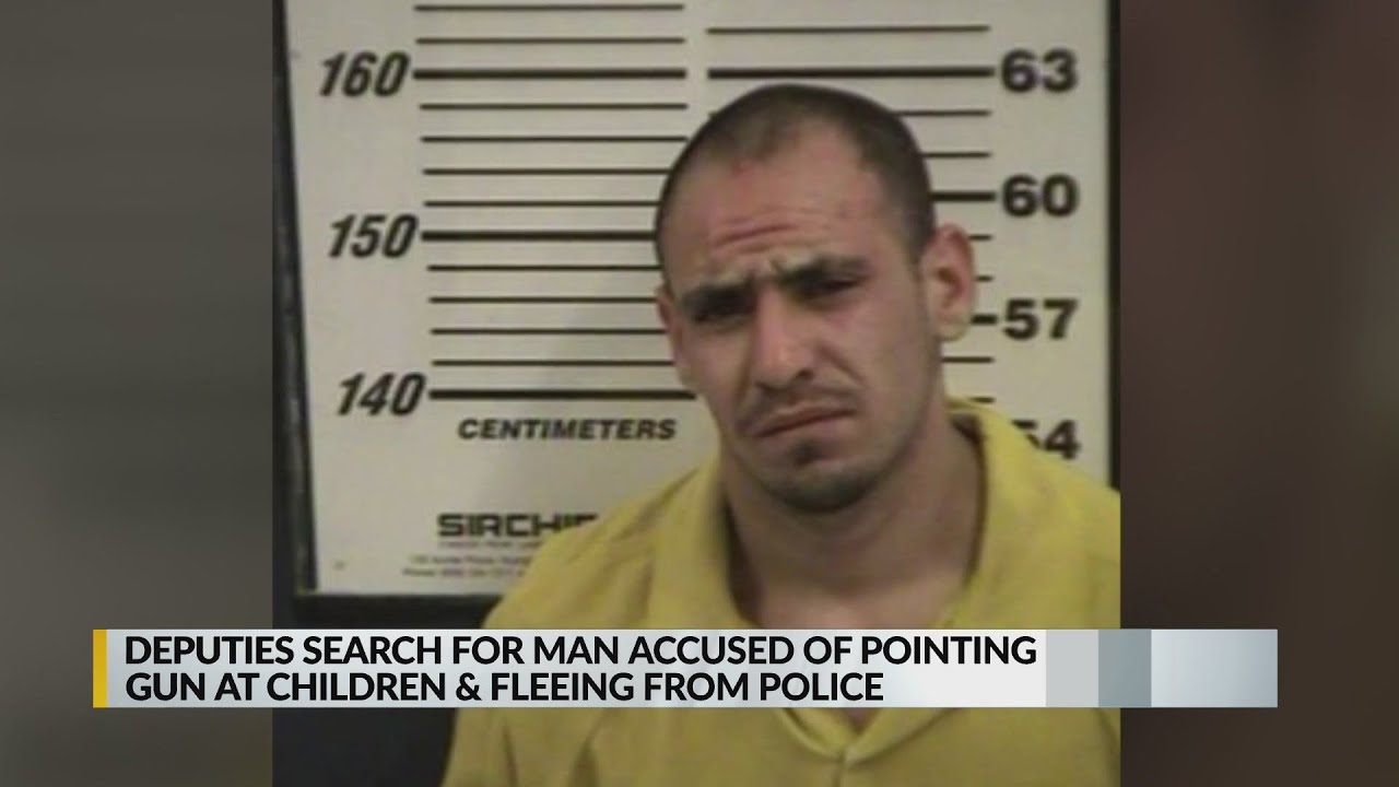 Deputies search for man accused of pointing gun at children - YouTube