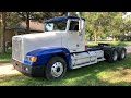 2000 Freightliner FLD 120 with a custom 6” extended day cab