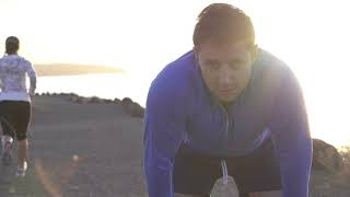 Man Jogging On The Beach And Looking To The Camera Slow Motion Shot At 60Fps