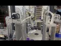 Trial video lids assembling machine spoon and lid assembler