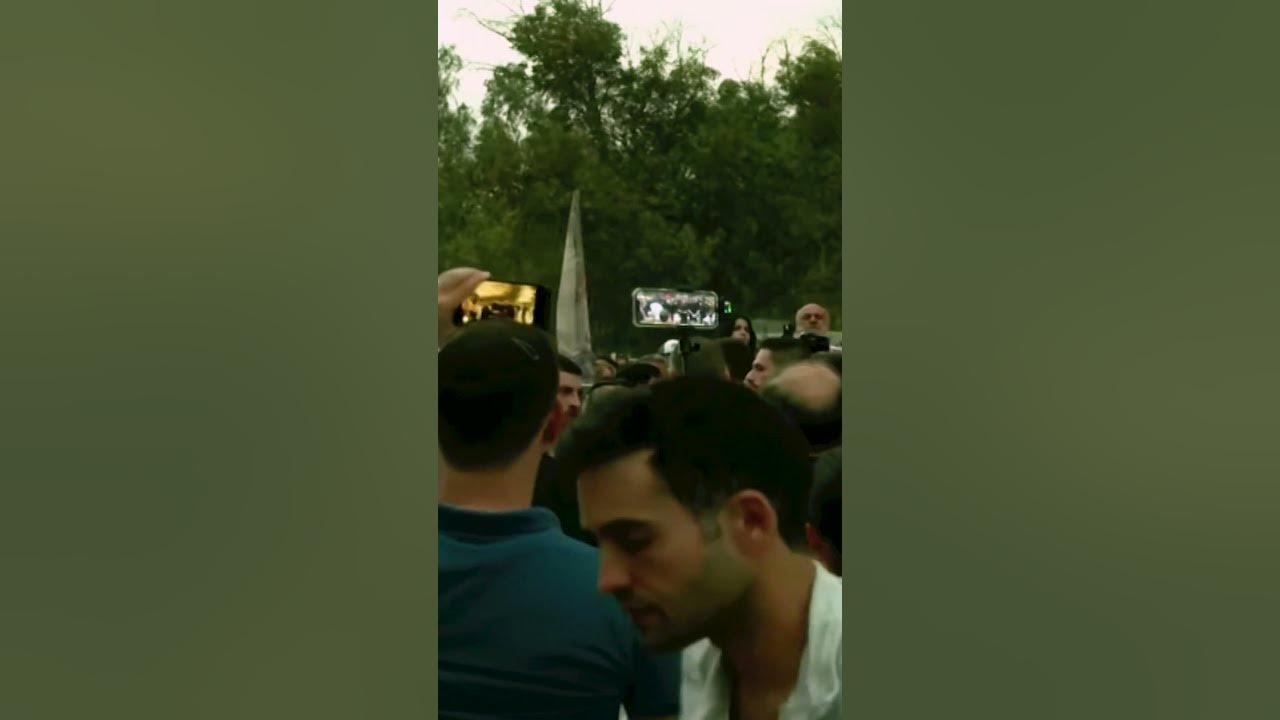 Families and friends mark moment Oct 7 attack began