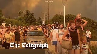 video: Holidaymakers flee as wildfires sweep across Rhodes