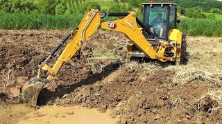 Caterpillar 444 excavator at workWe're doing a fishing pondAmenajare baltă de pescuit