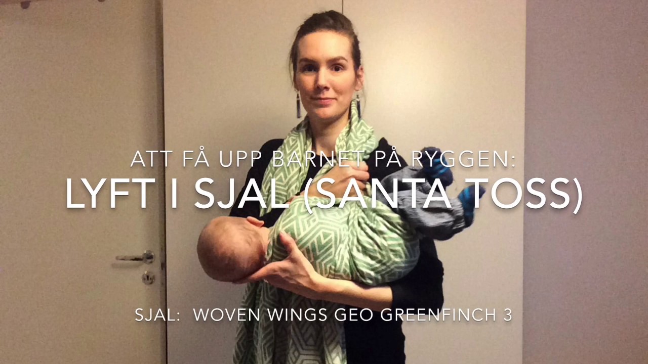 Att få upp barnet på ryggen: Lyft i sjal (Santa toss)