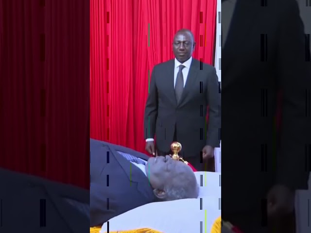 Deputy President Ruto Caught on Camera Laughing at Mwai Kibaki burial.... class=