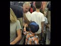 Raleigh boy gives fistbumps to everyone he can on plane