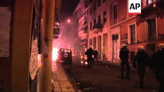 Police clash with demonstrators at rally to mark fifth anniversary of teenager's death