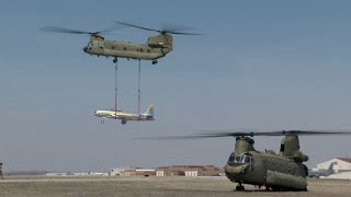 US ARMY &amp; NATO. The U.S. Army CH-47 Chinook Helicopters Brought the jet F-80  in Sioux City.