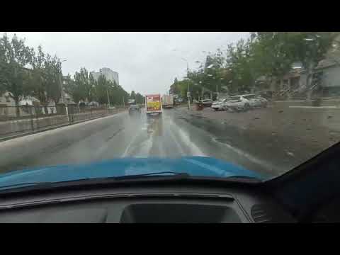 Луганск. Белая пена после дождя на асфальте.