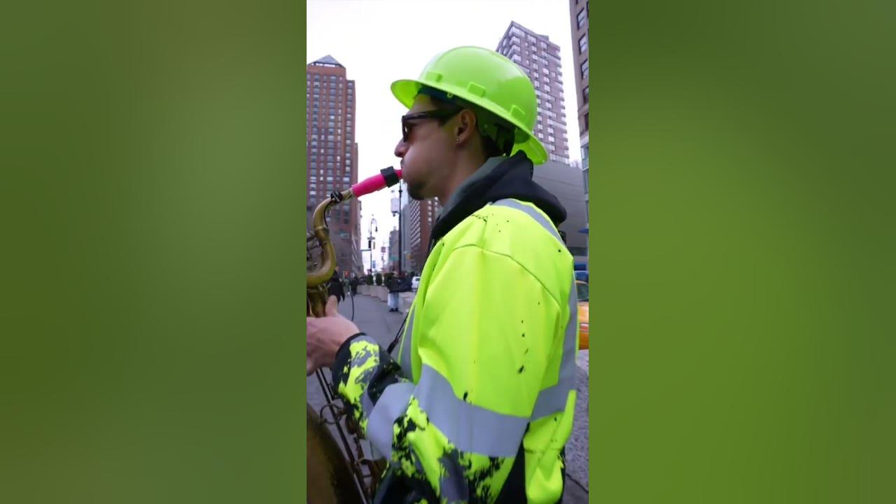art Traffic Cone Sax Man strikes in NYC art? prank party? sax