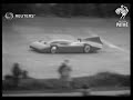 Sir malcolm campbell drives his car bluebird around the track at brooklands 1935