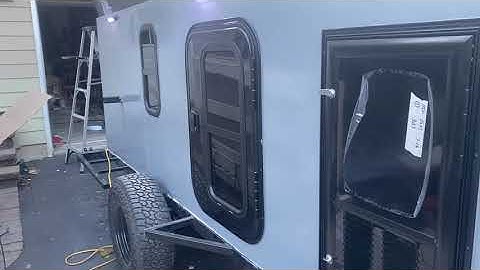 Day 34 window and vintage technologies door install on camper