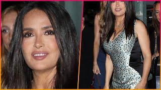 Salma Hayek, 57, is always the brunette bombshell in a busty optical illusion dress as she arrives