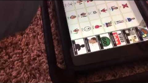 Teen with autism talking about pain with AAC