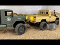 Jeep Rubicon vs. Toyota Land Cruiser 70 vs. 6x6 Truck | Epic RC Off-Road Obstacle Showdown!