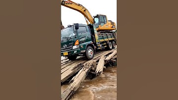 Truck Nearly Overturns on Fragile Wooden Bridge!