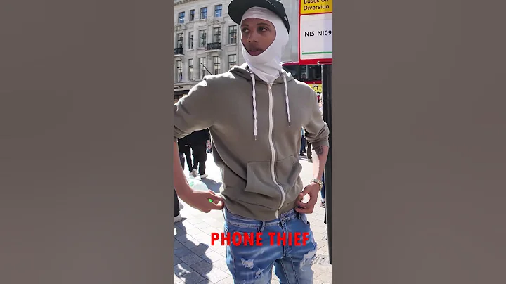 London thief trying to steal rider's phone off the bike, luckily spotted on time, robbery attempt.
