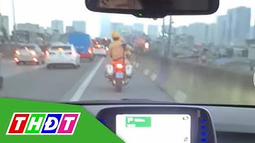 Hai CSGT ở Hà Nội dẫn đường cho cặp vợ chồng chở con đi cấp cứu | THDT