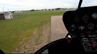 Taking off in Robinson R44 Helicopter