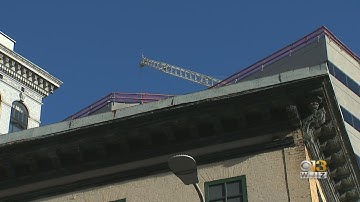 Crews Remove Damaged Scaffolding From BGE Building