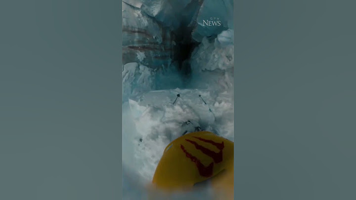 The terrifying moment a skier falls into a glacier crevasse