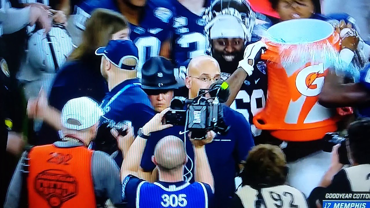Penn St beats Memphis, Coach Franklin tackles player in Gatorade