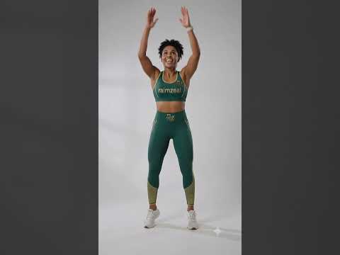 Female trainer demonstrates burpee