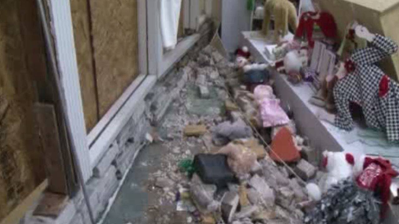 Car Falls Off Tow Truck, Hits Building - YouTube