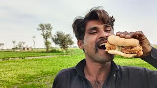 Pakistani tribal people try chicken fried steak burger for the first time