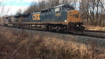 CSX Dash8 40cw 7929 leads Q276