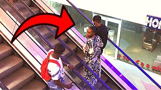 STARING AT STRANGERS ON AN ESCALATOR PRANK ! *IN AFRICA*