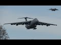 C-5 Super Galaxies and other military planes landing and taking off towards each other ✈️