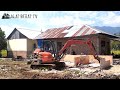 mini kubota u50 excavator sedang meratakan tanah bekas bongkaran rumah- Alat Berat TV