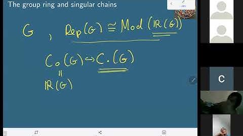Singular chains on Lie groups and the Cartan relations