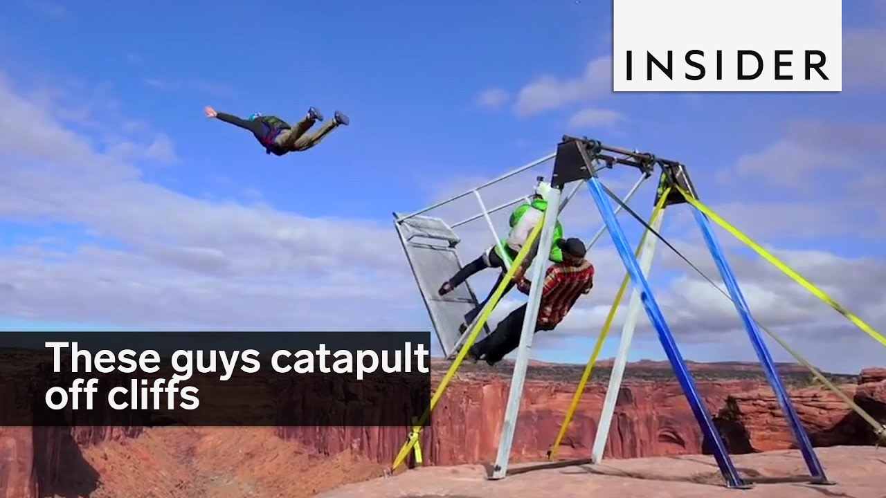 These guys built a giant swing to catapult them off a cliff