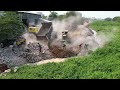 Wow excellent bulldozer pushing land build new road dump track pour the soil into water