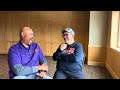 Curtis Aikens talks with Joe Dittmar, was on105th floor of the S Tower World Trade Center on 9/11.