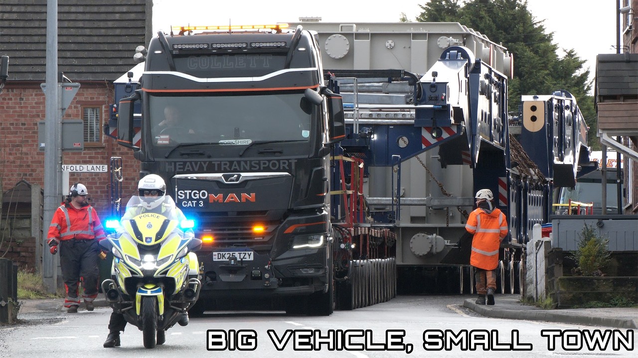 Super sized 567 tonne transport squeezes through town centre; police clear traffic
